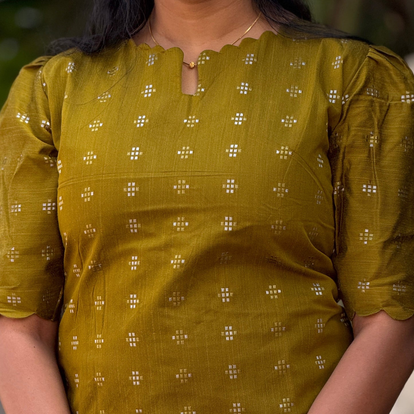 Thenmozhi